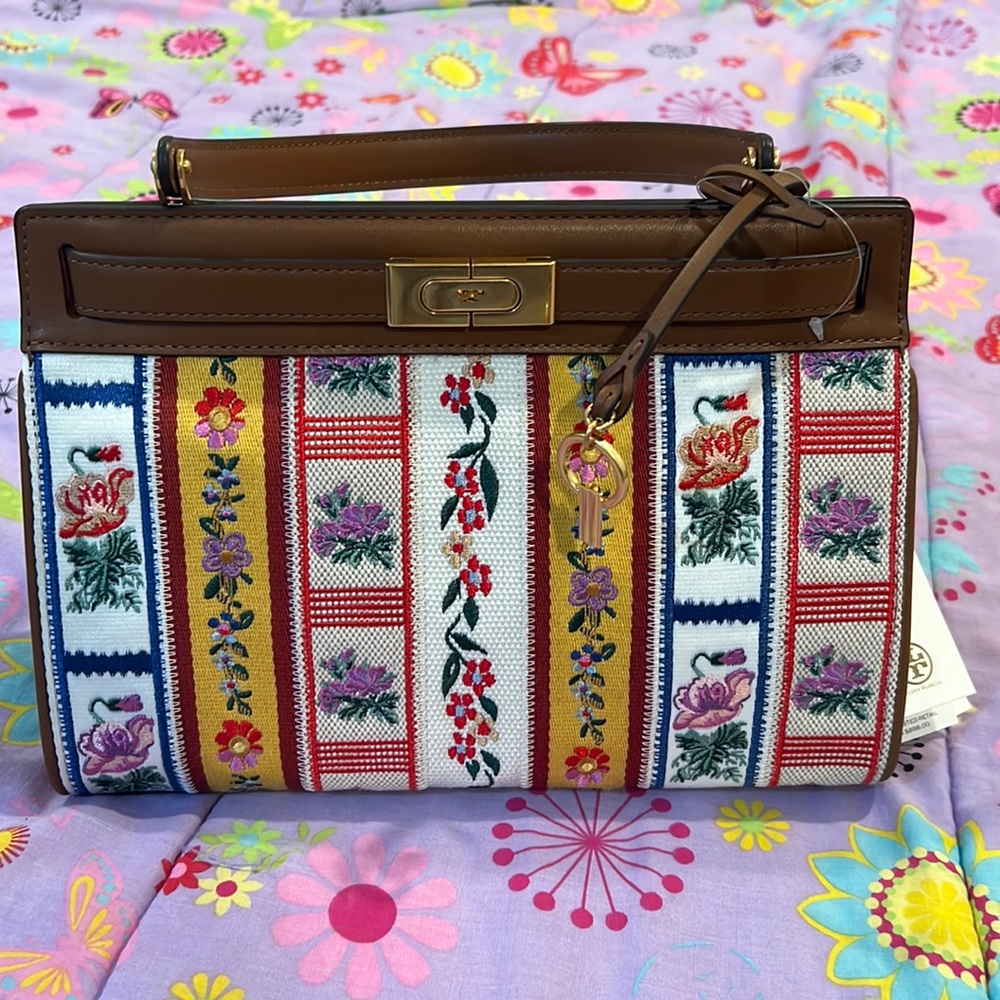 need to sell this tory burch never used purse. super cute authentic purse